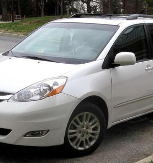 a white car parked in a parking lot