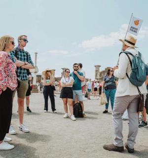 a group of people standing in front of a building