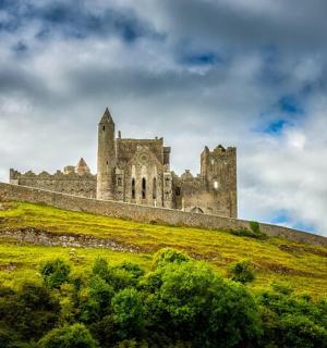 an old castle on top of a hill
