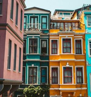 a row of colorful houses in a city
