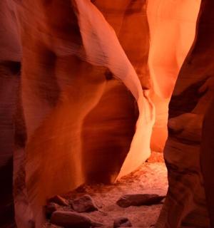 a slot canyon with a lot of rocks in it