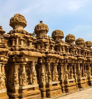 a stone building with domes on the side of it