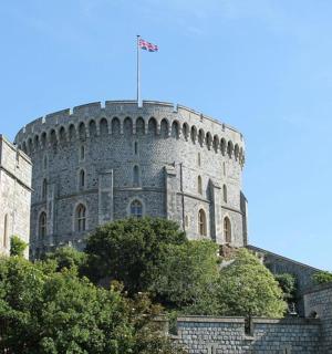 a castle with a flag on top of it