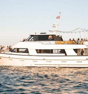 a group of people on a boat in the water