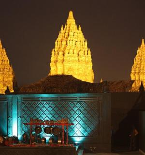 a building with lit up towers at night
