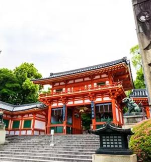 an orange building with stairs in front of it