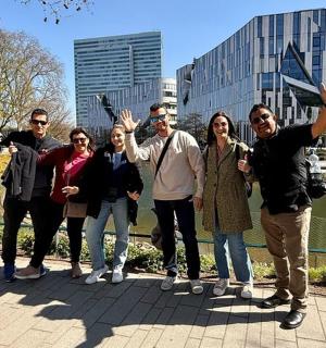 a group of people are posing for a picture