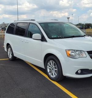 a white van parked in a parking lot