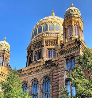 a large building with two domes on top of it