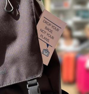 a tag attached to the back of a persons pocket