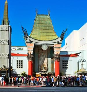a group of people standing in front of a building