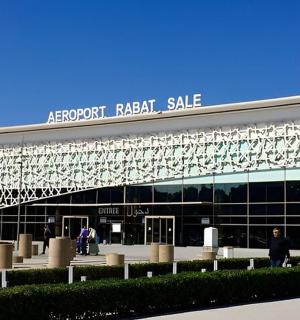 a large building with a sign on top of it