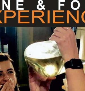 a group of women drinking wine and food experience