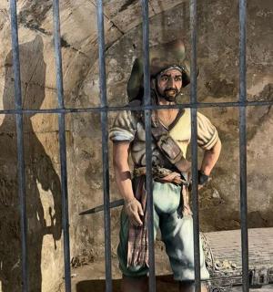 a man standing in a jail cell