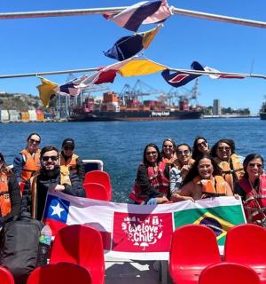a group of people on a boat in the water