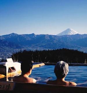 a couple of people sitting in a boat in the water