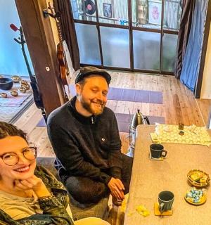 a man and a woman sitting at a table