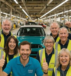 a group of people in front of a car