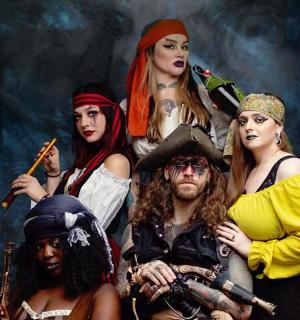 a group of people dressed up in costumes