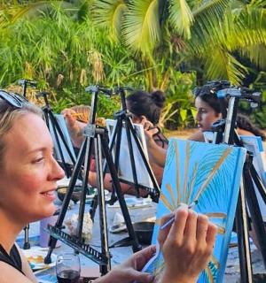 a group of women taking pictures with cameras