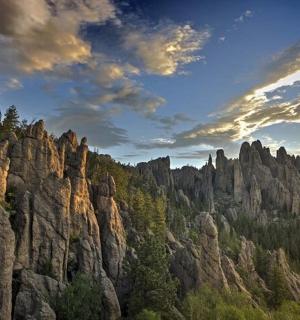 a view of a mountain range with trees