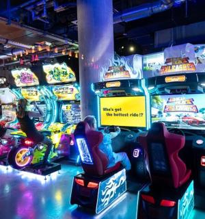 a group of arcade games in a room