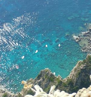a view of the ocean with boats in the water