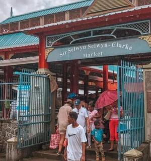 a group of people standing outside of a building