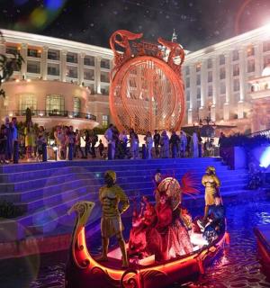 a group of people standing on steps in front of a building