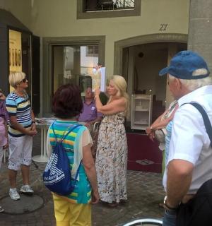 a group of people standing outside of a building