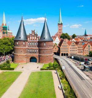a castle in the middle of a city with a road