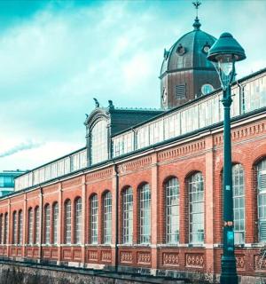 a building with a street light in front of it