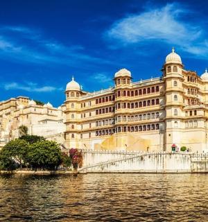 a large building next to a body of water