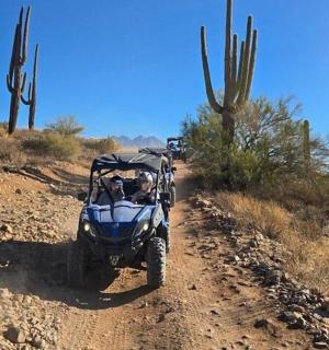 a atv on a dirt road in the desert