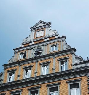 a tall building with a clock tower on top of it