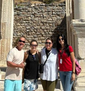 a group of people standing in front of a building