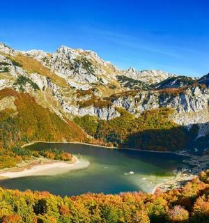 a lake in the middle of a mountain range