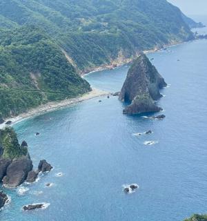 an aerial view of an island in the ocean