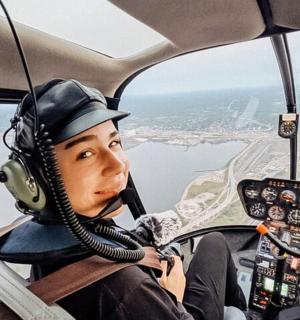a boy in the cockpit of an airplane