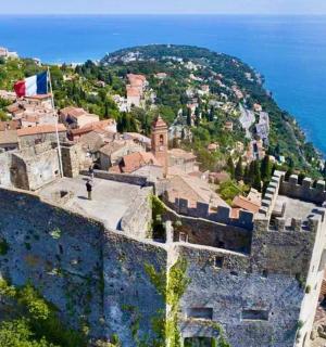 an aerial view of a town with a castle