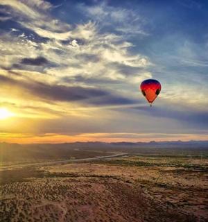 a hot air balloon flying in the sky