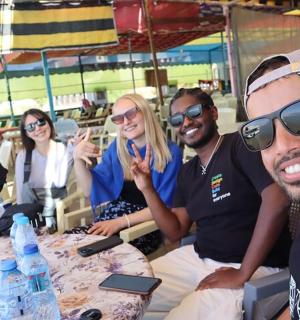 a group of people sitting around a table