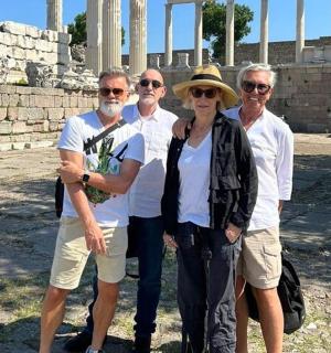 a group of people standing in front of a building