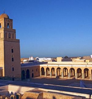 a building with a clock tower on top of it