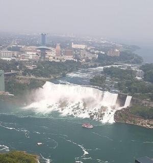 an aerial view of a waterfall on a river