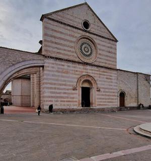 a large brick building with a clock on it