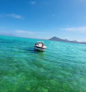 a boat in the middle of a large body of water