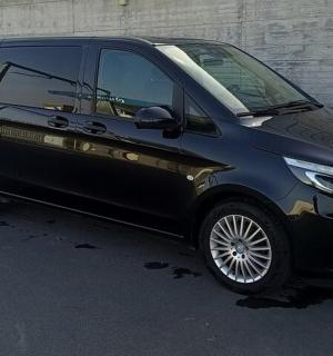 a black van parked in a parking lot