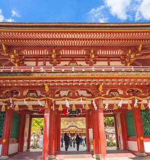 a temple with a large roof on top of it