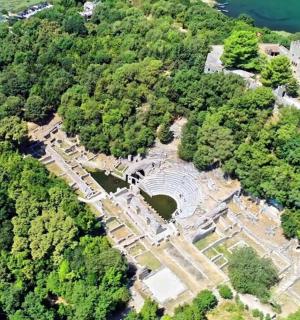 an aerial view of an old building on a mountain